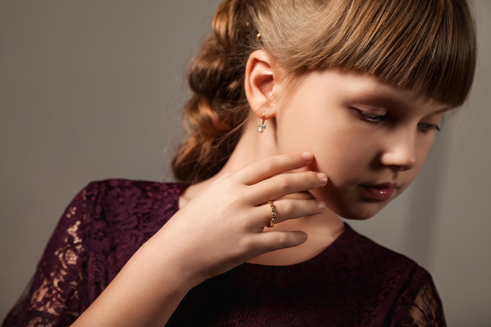 close-up-portrait-of-little-girl-with-hairstyle-an-2023-11-27-05-29-44-utc